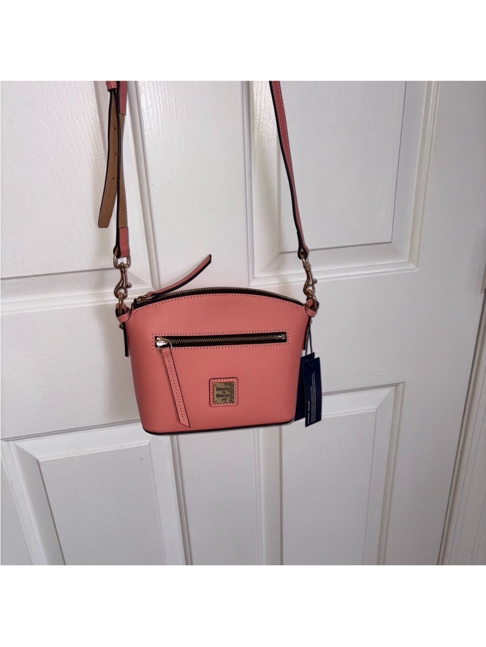 Dooney & Bourke Light Pink Smooth Leather Domed Crossbody Purse